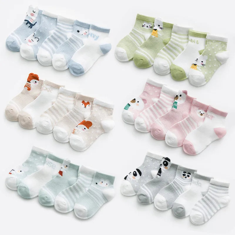 Set of baby socks with animal designs on a white background
