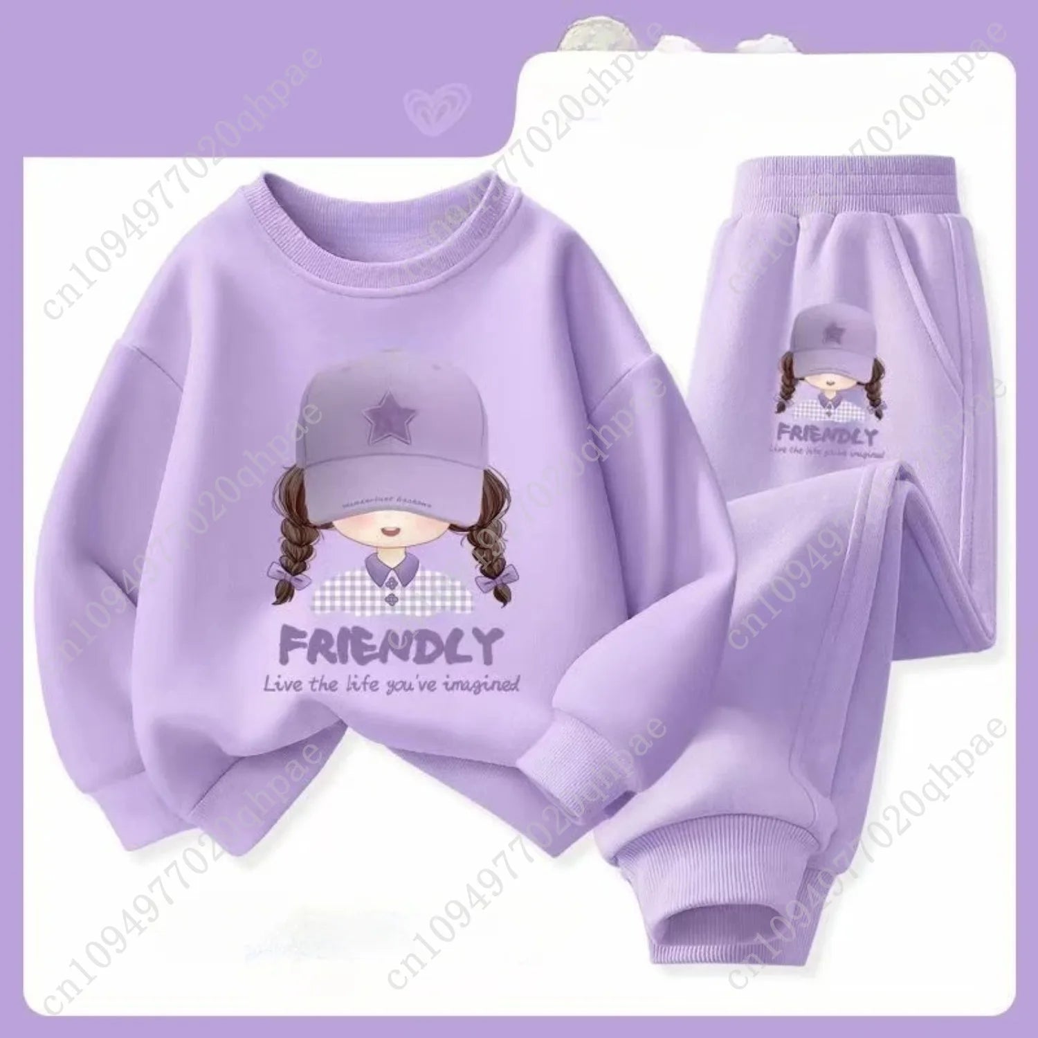 Purple children's sweatshirt and pants set with cartoon character design on a light purple background.