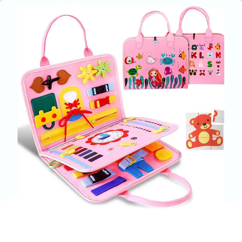 Pink educational toy with various interactive elements on a white background