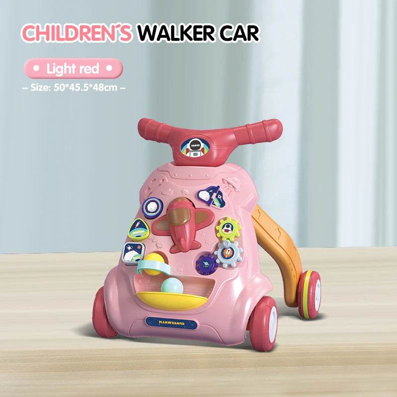 Children's walker car in light red color on a wooden surface with a light blue curtain background.