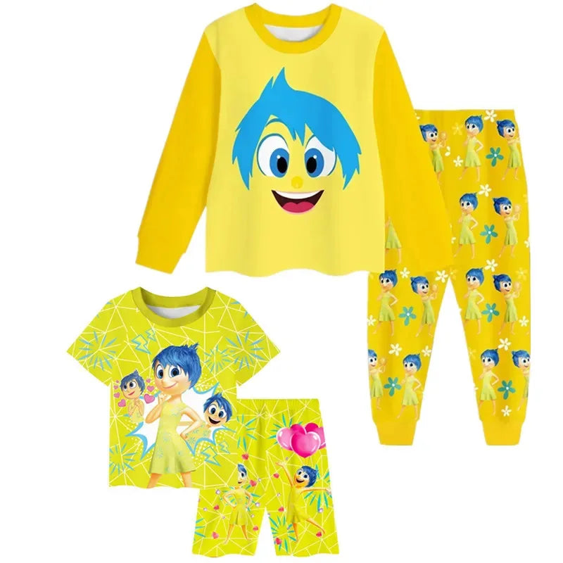 Yellow children's pajama set with cartoon character design on a white background