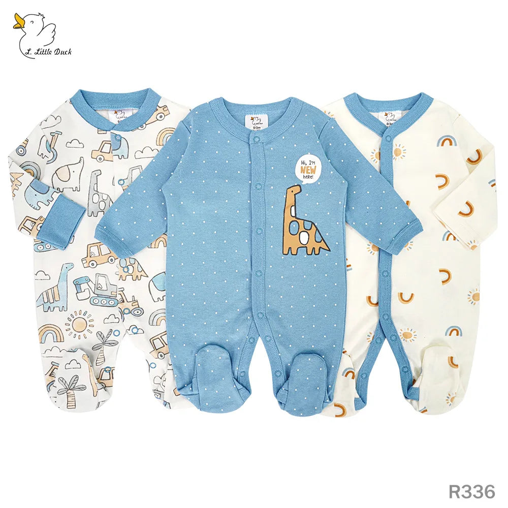 Three baby rompers with different patterns on a white background