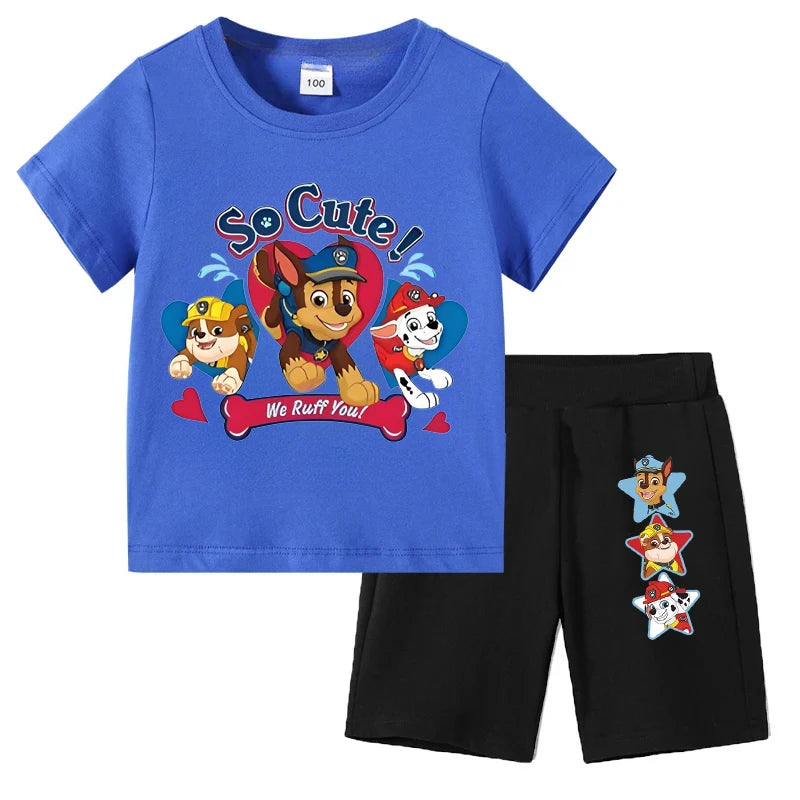Children's blue t-shirt with cartoon characters and black shorts on a white background