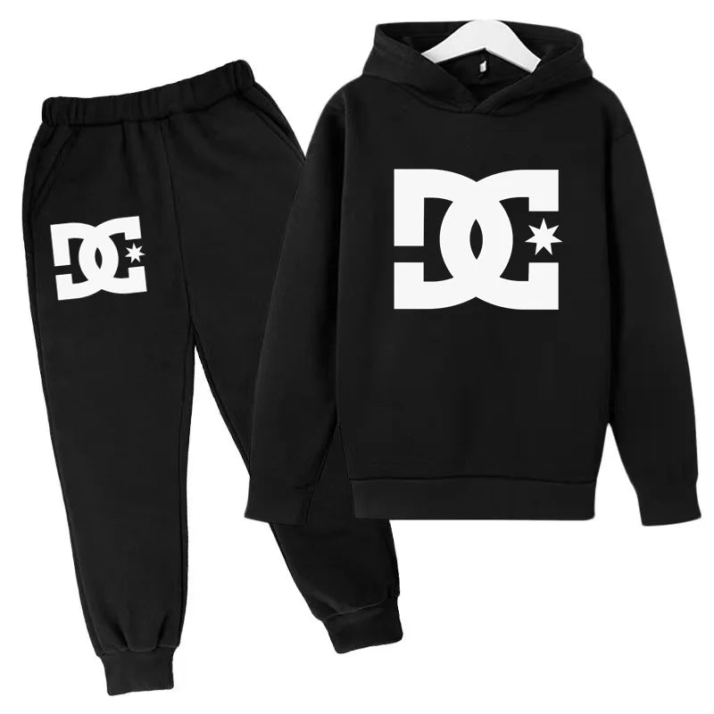 Black hoodie and sweatpants set with DC logo on a white background
