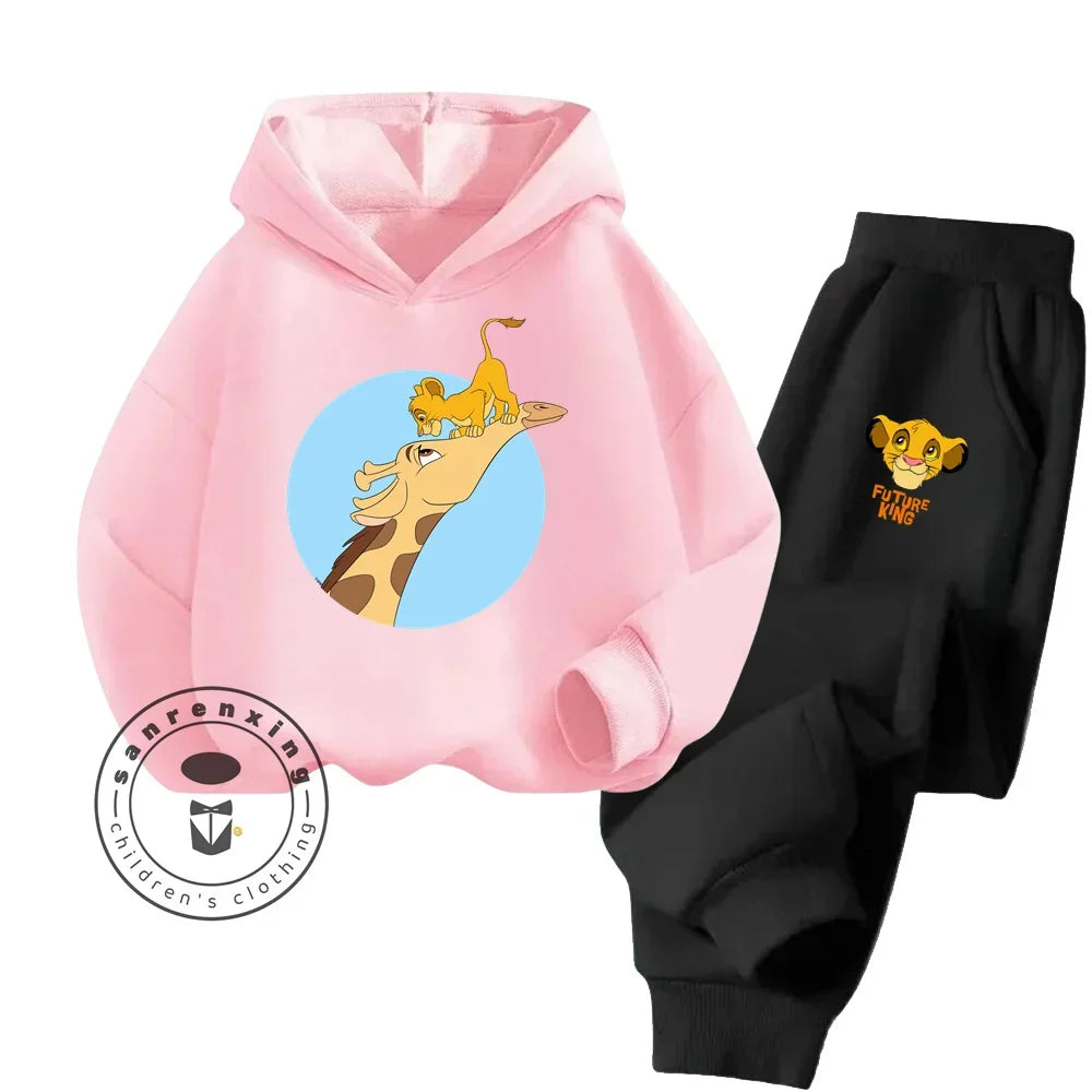 Pink hoodie with cartoon design and black pants with lion king logo on a white background