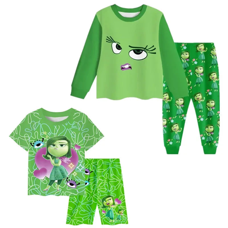 Green children's pajama set with cartoon character design on a white background